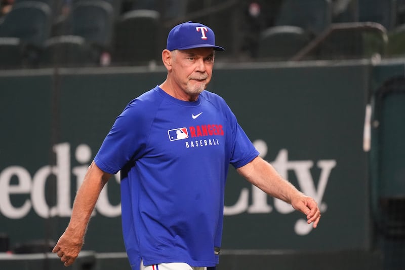 Texas Rangers manager Bruce Bochy walks on the field before a baseball game against the Athletics, Tuesday, July 22, 2025, in Arlington, Texas. (AP Photo/LM Otero)