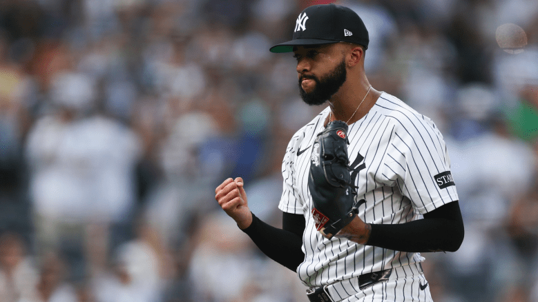 Yankees reliever Devin Williams delivers a pitch during a game at Yankee Stadium. The two-time All-Star, coming off a down season, is drawing free agent interest from the Miami Marlins, who are seeking a proven closer for 2026.