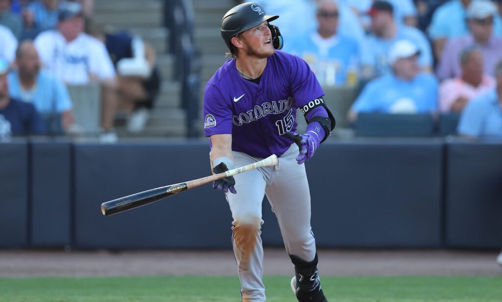 TAMPA, FL - MARCH 28: Hunter Goodman #15 of the Colorado Rockies hits a double during the game between the Colorado Rockies and the Tampa Bay Rays at George M. Steinbrenner Field on Friday, March 28, 2025 in Tampa, Florida. (Photo by Mike Carlson/MLB Photos via Getty Images)