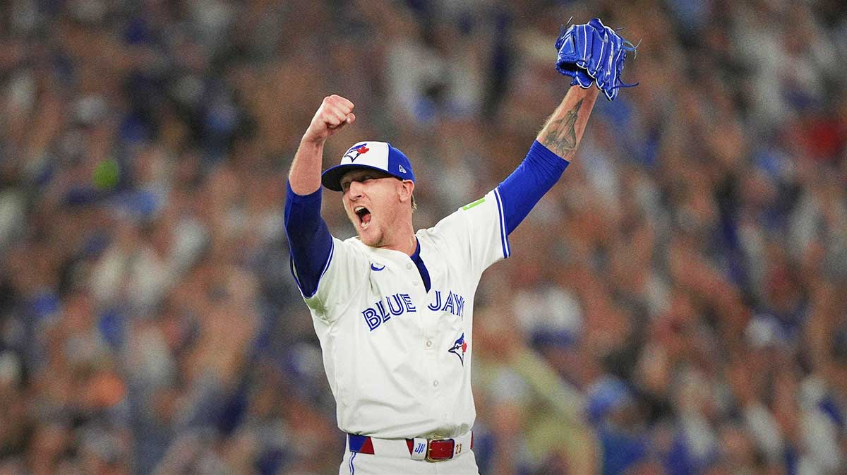 Toronto Blue Jays pitcher Jeff Hoffman (23) celebrates after defeating the Seattle Mariners in game seven of the ALCS round for the 2025 MLB playoffs at Rogers Centre.