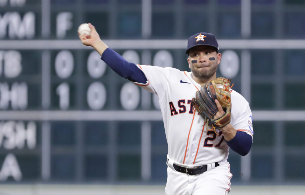 Jose Altuve throwing a baseball