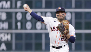 Jose Altuve throwing a baseball