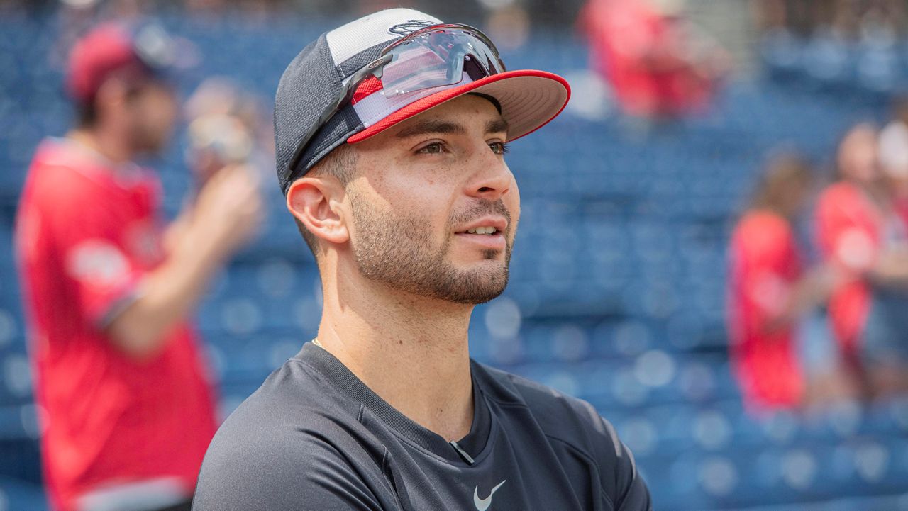Cleveland Guardians' CJ Kayfus talks with reporters as he prepares for his major league debut before a baseball game against the Minnesota Twins, Saturday, Aug. 2, 2025, in Cleveland.
