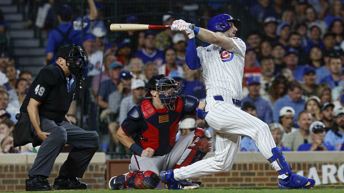Chicago Cubs right fielder Kyle Tucker (30) hits a three-run home run against the Atlanta Braves during the third inning at Wrigley Field.