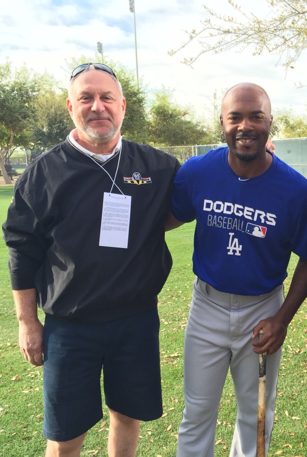 Dave Davis poses for a picture with former Philadelphia Phillies player Jimmy Rollins. (Courtesy of Meredith Kim)