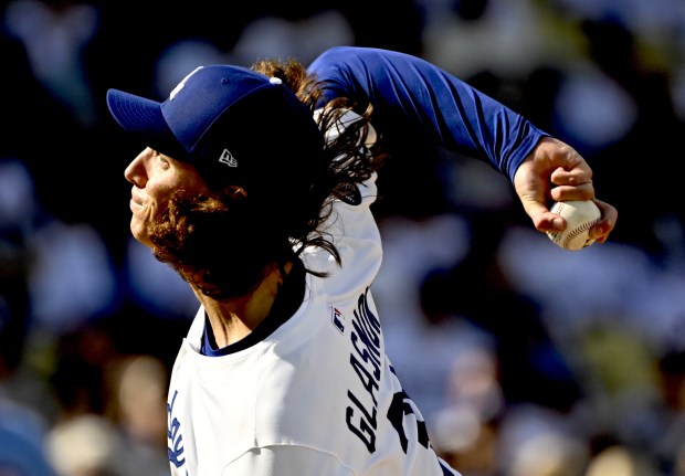 Dodgers starting pitcher Tyler Glasnow throws to the plate during...
