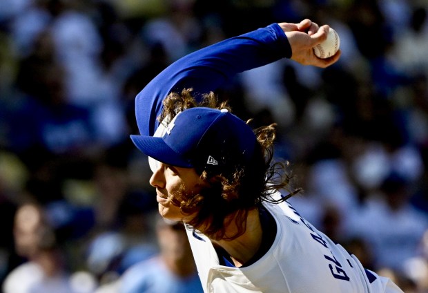 Dodgers starting pitcher Tyler Glasnow throws to the plate during...
