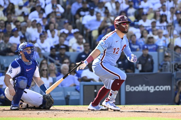 Philadelphia Phillies slugger Kyle Schwarber hits a double during the...