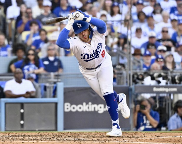 The Dodgers’ Kike Hernandez gets out of the way of...