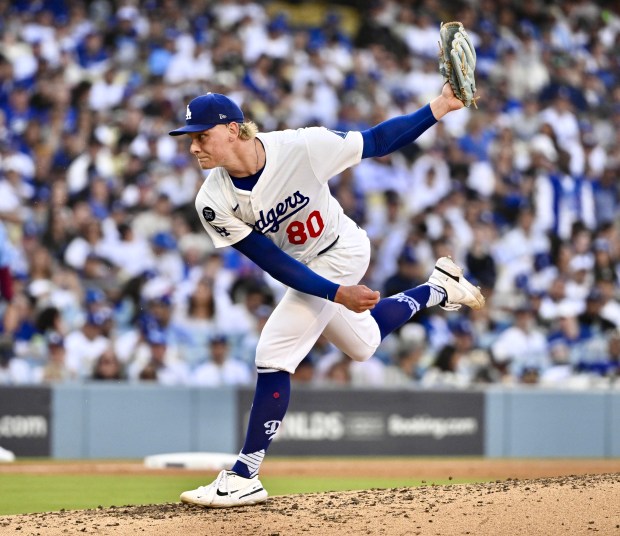 Dodgers relief pitcher Emmet Sheehan throws to the plate during...