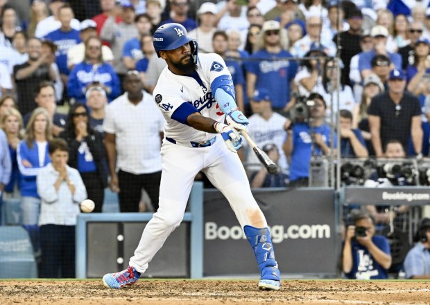 The Dodgers’ Teoscar Hernández strikes out swinging with bases loaded...