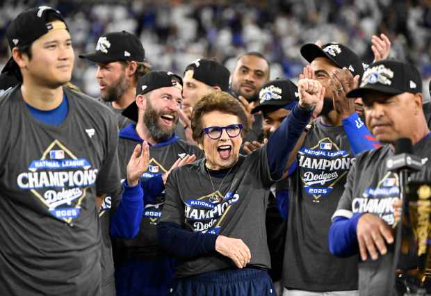 Billie Jean King celebrates after the Dodgers defeated the Milwaukee...