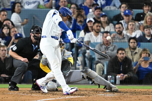 Dodgers star Shohei Ohtani connects for a titanic solo home...