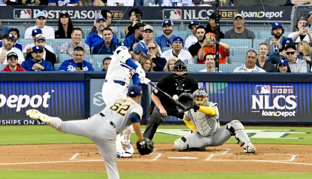 Dodgers star Shohei Ohtani hits a solo home run during...