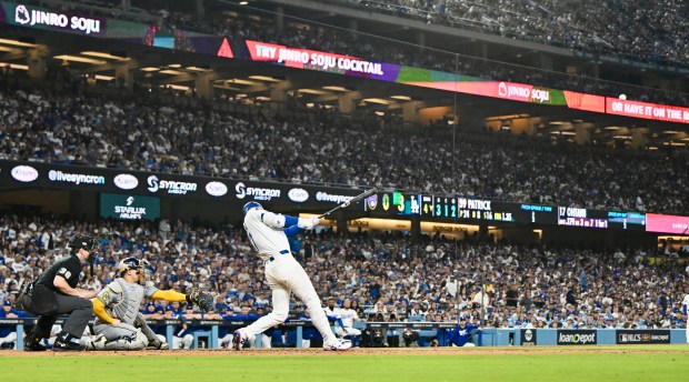 Dodgers star Shohei Ohtani connects for a titanic solo home...