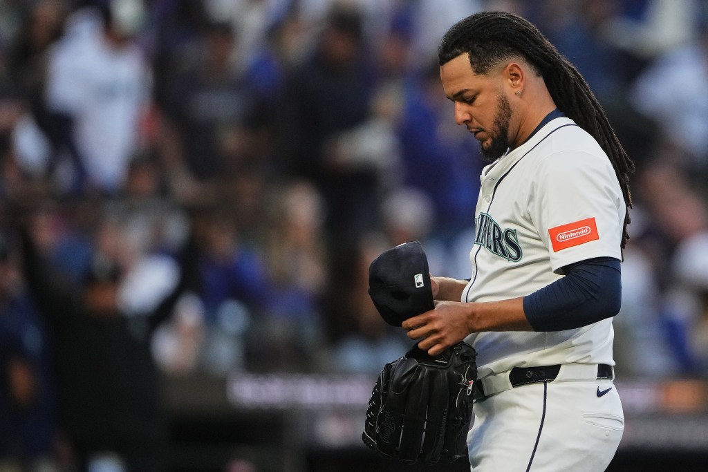 Seattle Mariners starting pitcher Luis Castillo walks back to the dugout after the top of the fourth inning in Game 2 of baseball's American League Division Series against the Detroit Tigers, Sunday, Oct. 5, 2025, in Seattle. 