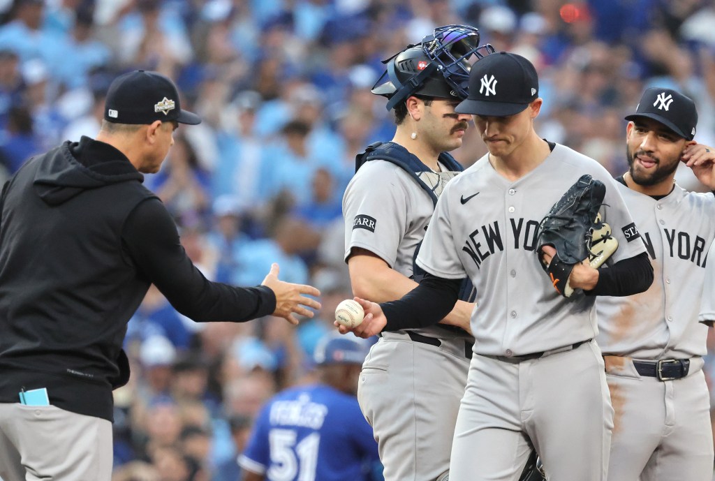 Aaron Boone takes Luke Weaver out of the game in the seventh inning of the Yankees' Game 1 blowout loss to the Blue Jays.