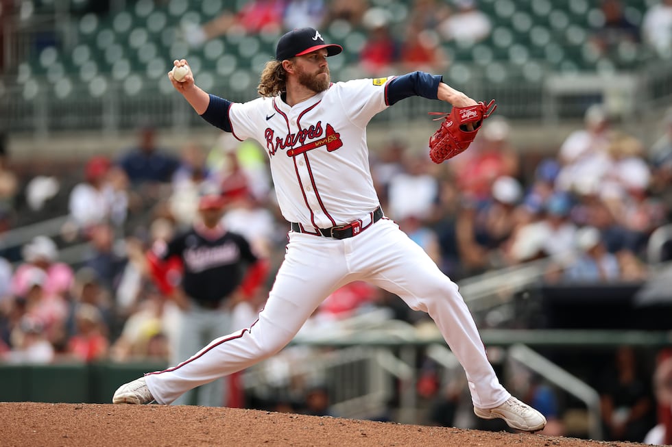 Atlanta Braves pitcher Pierce Johnson delivers in the ninth inning of a baseball game against...