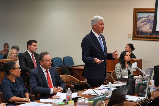 Attorney Todd Theodora gestures before opening statements in the trial...