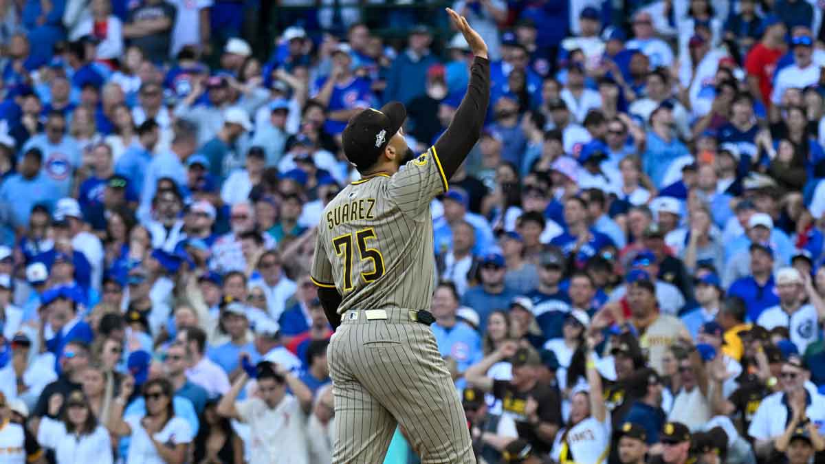 San Diego Padres relief pitcher Robert Suarez (75) reacts after the final out for the win against the Chicago Cubs in the ninth inning during game two of the Wildcard round for the 2025 MLB playoffs at Wrigley Field.