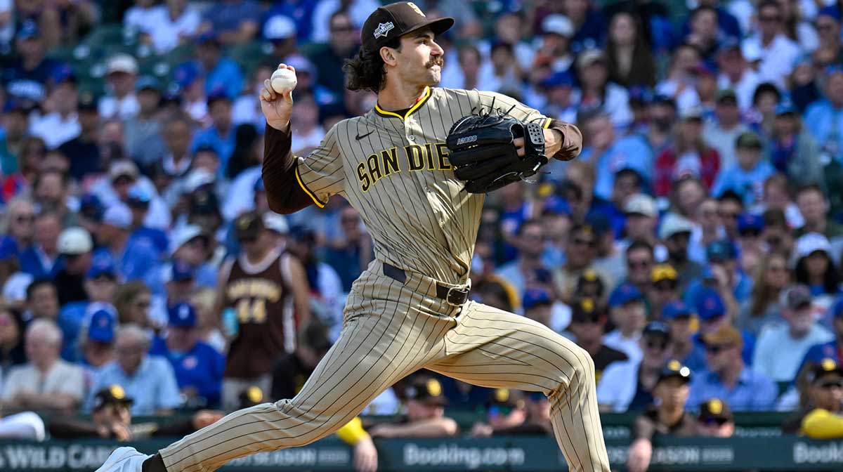 San Diego Padres starting pitcher Dylan Cease (84) delivers a pitch against the Chicago Cubs in the first inning during game two of the Wildcard round for the 2025 MLB playoffs at Wrigley Field. 