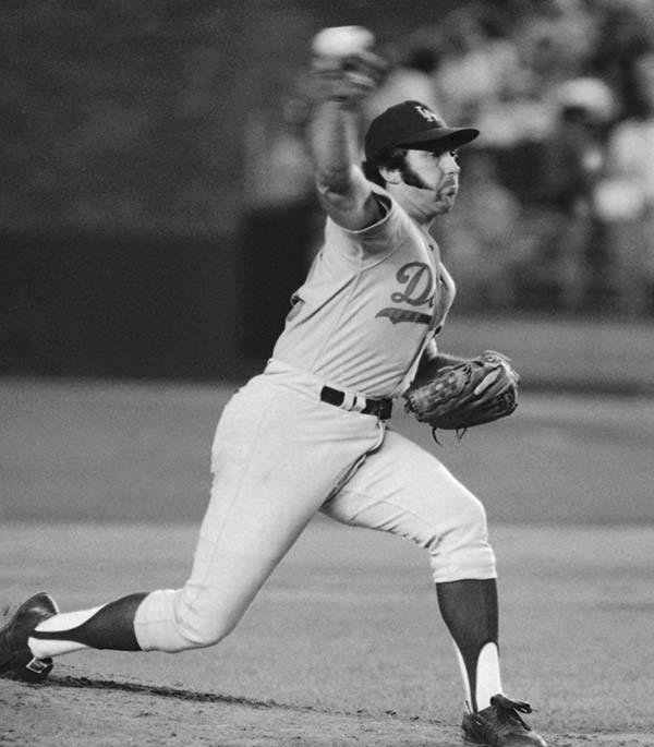 Mike Marshall is shown pitching in a major league baseball game in August 1974