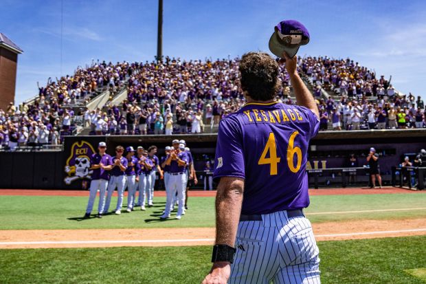 Trey Yesavage tips his cap to the home crowd as...