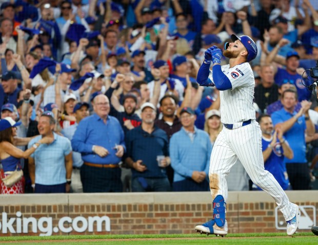 Michael Busch #29 of the Chicago Cubs celebrates after hitting a home run in the seventh inning against the San Diego Padres during the NL Wild Card Series at Wrigley Field on Oct. 2, 2025 in Chicago, Illinois. (Photo by K.C. Alfred / The San Diego Union-Tribune)