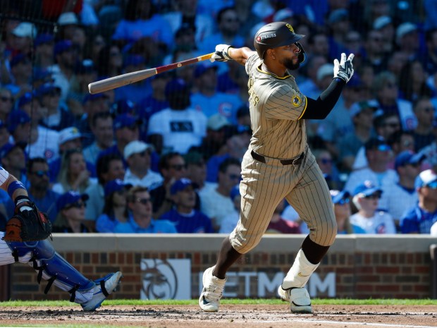Xander Bogaerts #2 of the San Diego Padres hits a RBI double in the second inning against the Chicago Cubs during Game 1 of the NL Wild Card Series at Wrigley Field on Sept. 30, 2025 in Chicago, Illinois. (Photo by K.C. Alfred / The San Diego Union-Tribune)