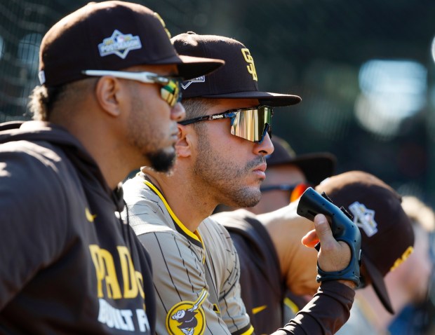 Elias Díaz #17 of the San Diego Padres and Ramón Laureano #5 look on against the Chicago Cubs during Game 1 of the NL Wild Card Series at Wrigley Field on Sept. 30, 2025 in Chicago, Illinois. (Photo by K.C. Alfred / The San Diego Union-Tribune)