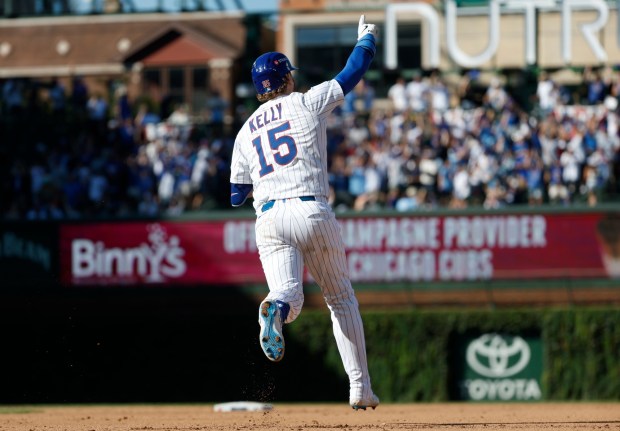 Carson Kelly #15 of the Chicago Cubs rounds the bases after hitting a home run against the San Diego Padres during Game 1 of the NL Wild Card Series at Wrigley Field on Sept. 30, 2025 in Chicago, Illinois. (Photo by K.C. Alfred / The San Diego Union-Tribune)