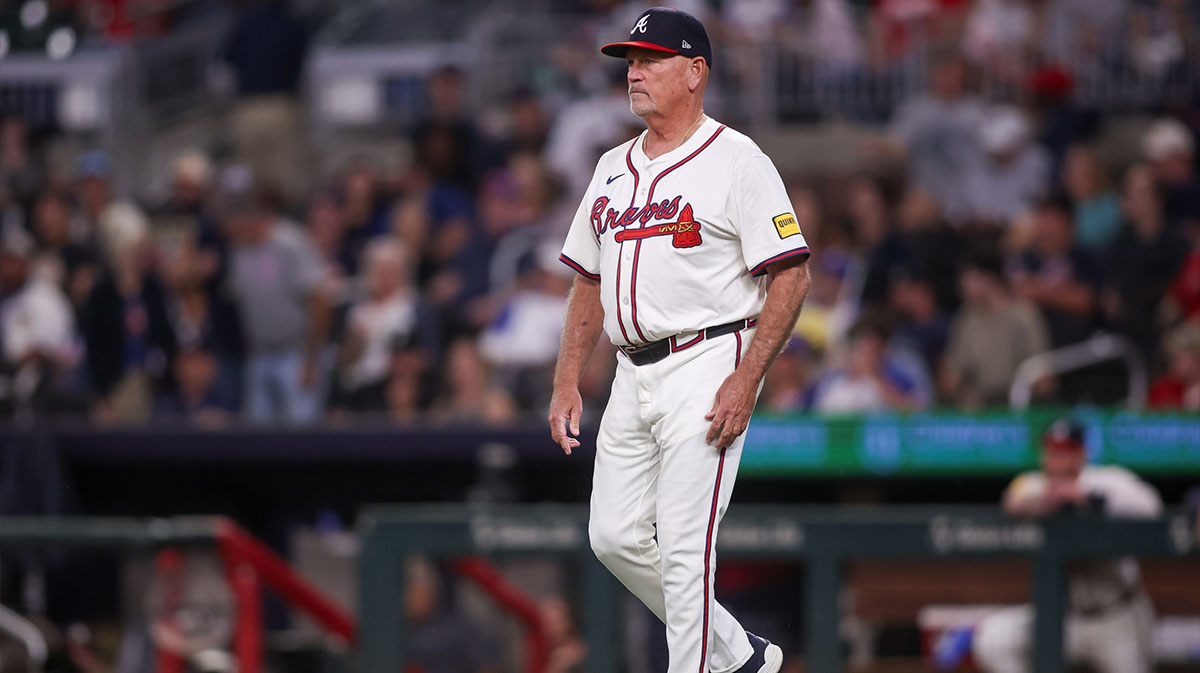 Atlanta Braves manager Brian Snitker (43) makes a pitching change against the Chicago Cubs in the seventh inning at Truist Park