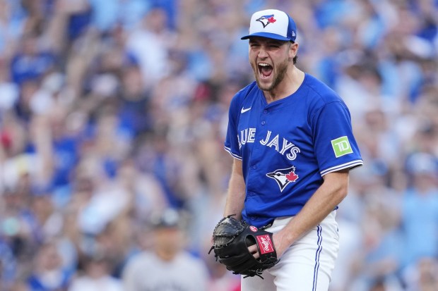 Trey Yesavage of the Toronto Blue Jays celebrates after his...