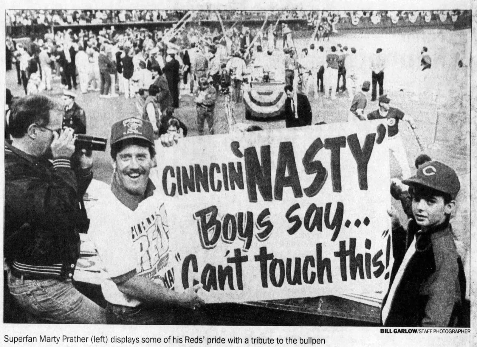 Marty Prather, of Bellbrook, was considered a Reds superfan. He was known for bring large, clever and professionally painted signs to the ballpark. Game 2 of the 1990 World Series was no exception. DAYTON DAILY NEWS ARCHIVES