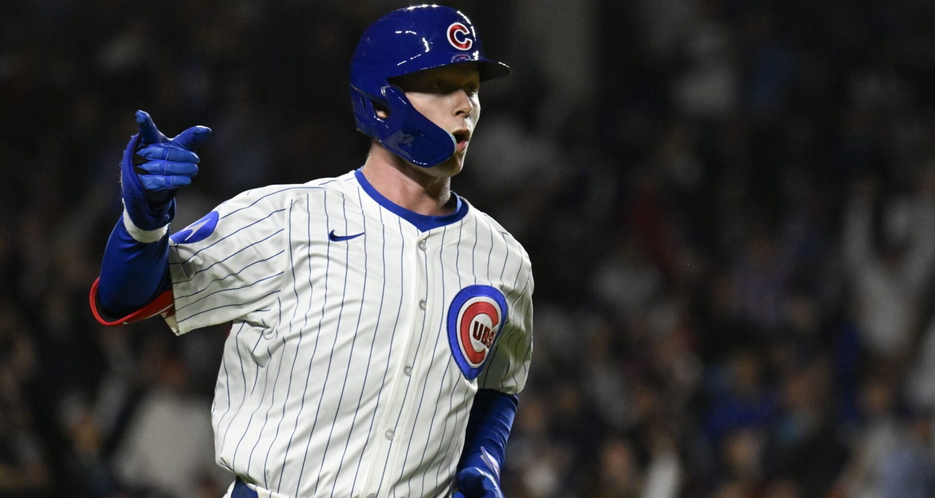 Chicago Cubs outfielder Pete Crow-Armstrong (4) runs after he hits a two run home run during the fifth inning against the Los Angeles Dodgers at Wrigley Field
