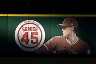 FILE - An image and logo memorializing former Los Angeles Angels pitcher Tyler Skaggs is...