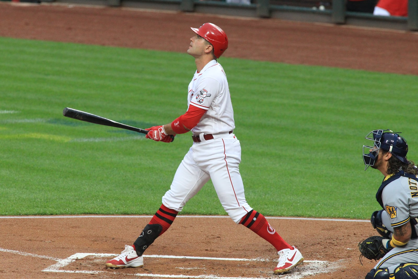 Joey Votto, of the Reds, hits a two-run home run against the Brewers on Wednesday, Sept. 23, 2020, at Great American Ball Park in Cincinnati. David Jablonski/Staff