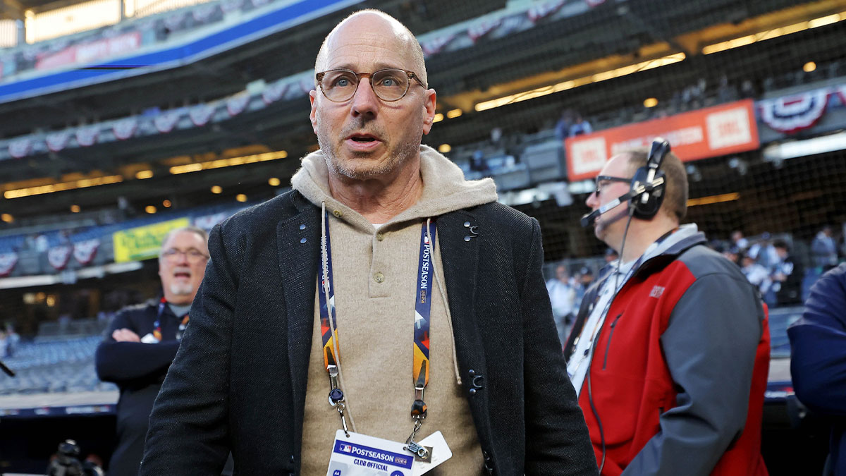 Yankees general manager Brian Cashman walks on the field before game three of the 2024 MLB World Series between the New York Yankees and the Los Angeles Dodgers at Yankee Stadium