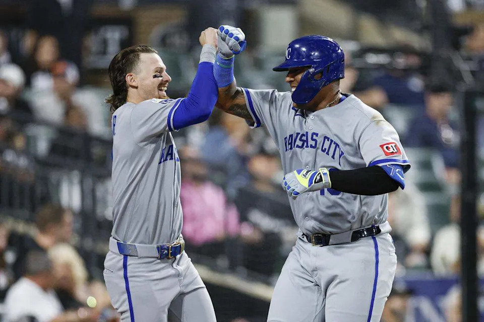Kansas City Royals catcher Salvador Perez (13) celebrates with shortstop Bobby Witt Jr. (7) after hitting a solo home run against the Chicago White Sox during the fifth inning at Rate Field on Aug 27, 2025 in Chicago, Illinois, USA.