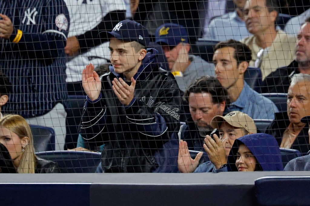Kylie Jenner and Timothée Chalamet at the New York Yankees vs Toronto Blue Jays game.