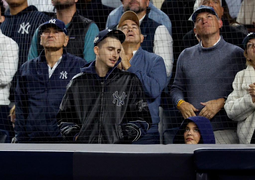 Kylie Jenner and Timothée Chalamet at the New York Yankees vs Toronto Blue Jays game.