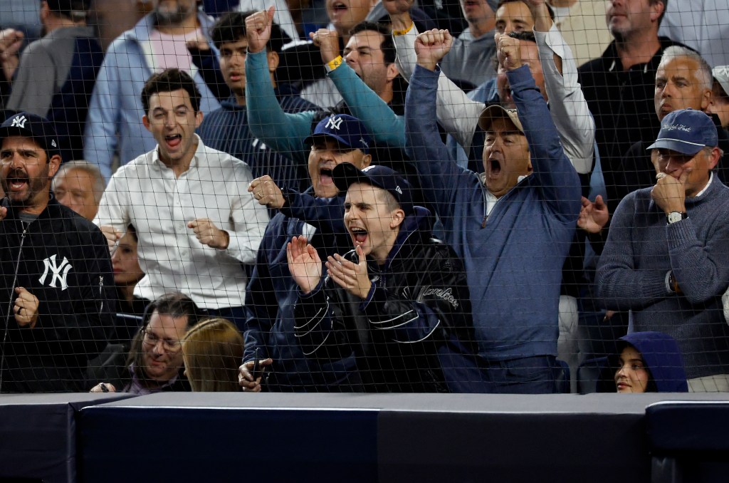 Kylie Jenner and Timothée Chalamet at the New York Yankees vs Toronto Blue Jays game.