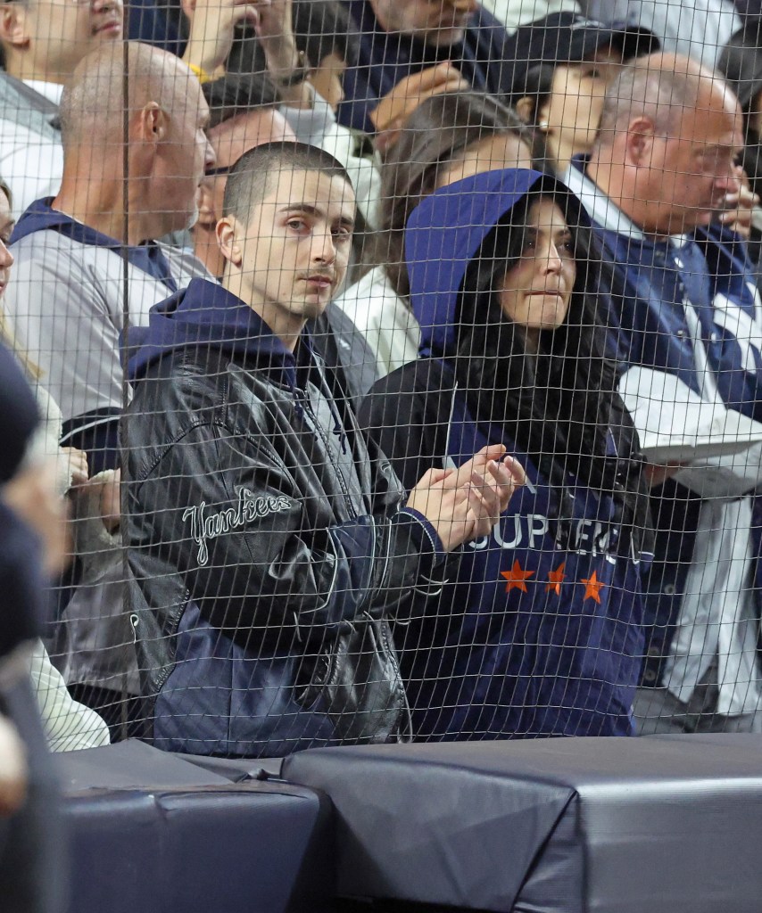 Kylie Jenner and Timothée Chalamet at the New York Yankees vs Toronto Blue Jays game.