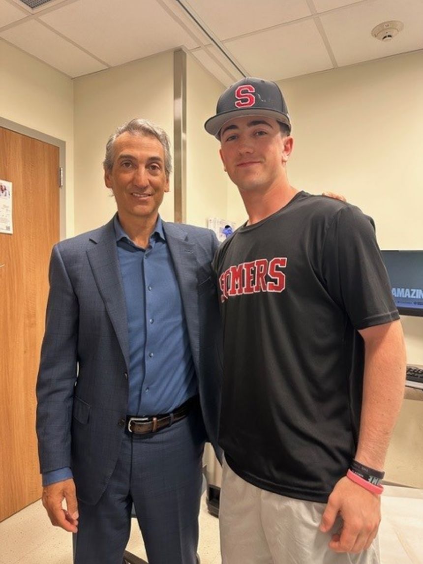 Alex Hoffman (right) with Dr. Christopher Ahmad, the surgeon who performed a Tommy John operation on his elbow for a UCL injury.