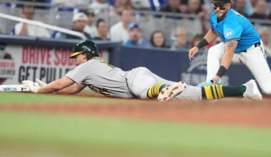 Kurtz triples, scores and Ferguson retires 3 straight in the 9th to lift Athletics over Miami Marlins 3-2