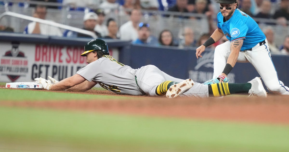 Kurtz triples, scores and Ferguson retires 3 straight in the 9th to lift Athletics over Miami Marlins 3-2