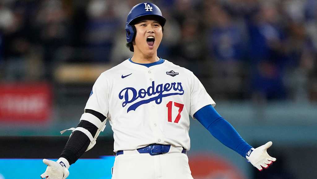 Shohei Ohtani homered twice and tied a 119-year-old major league record with four extra-base hits in Game 3 of the World Series, putting on yet another historic postseason show at Dodger Stadium
