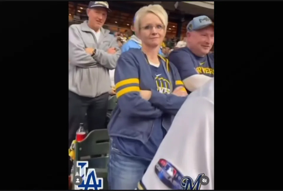 A Brewers fan lost her job after suggesting she should 'call ICE' on a Latino Dodgers fan during a playoff game (Courtesy of Ricardo Fosado)