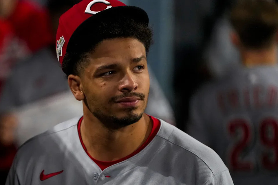 Pitcher Chase Burns heads to the clubhouse after the final out of the ninth inning of the Reds' 8-4 loss to the Los Angeles Dodgers on Oct. 1. Burns was one of 16 Reds who got their first test of the postseason.