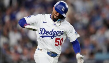 Los Angeles Dodgers' Mookie Betts reacts as he drives in a run with a single during the third inning in Game 2 of the National League Wild Card baseball playoff series against the Cincinnati Reds on Wednesday in LA. (AP Photo/Mark J. Terrill)